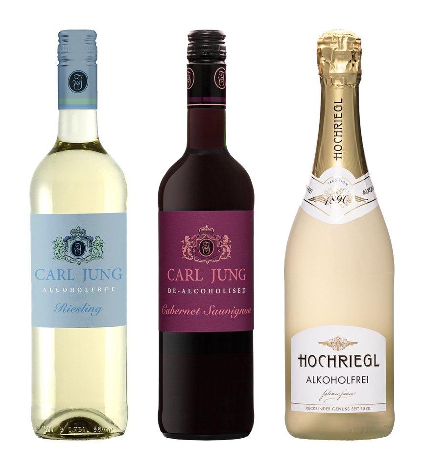 Bottles of non-alcoholic wines: white Carl Jung Riesling, red Carl Jung Cabernet Sauvignon and sparkling Hochriegl.