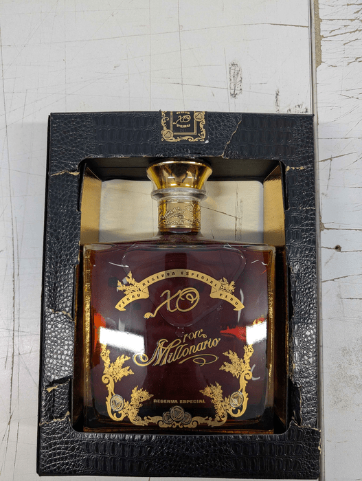 Ron Millonario XO - poškozený obal