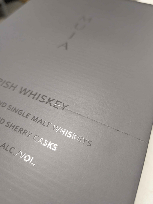 Muja Irish Whiskey - poškodený obal
