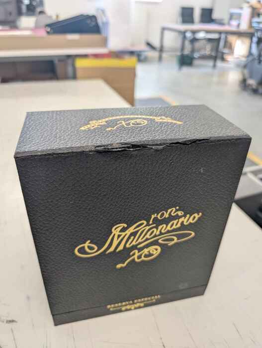Ron Millonario XO - damaged packaging