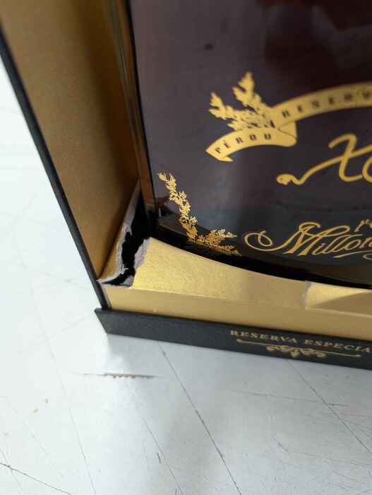 Ron Millonario XO - poškodený obal